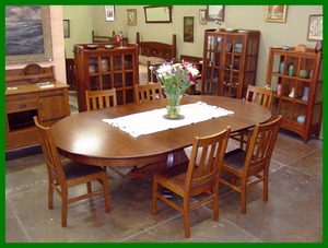 Original Stickley Brothers Dining Table with 4 leaves.